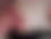 De cerca ordeñando tetitas.