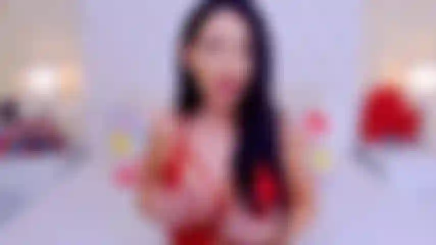 Morena de grandes tetas provocando y jugando.