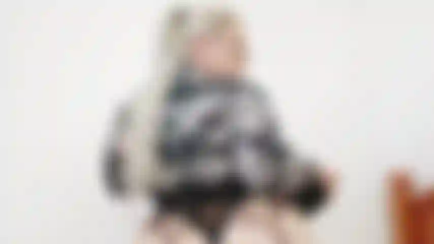 Botín gordo inclinado sacudido.