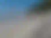 Chillin y fumando un cigarrillo en la playa.