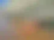 Relajante en la playa desnudo.