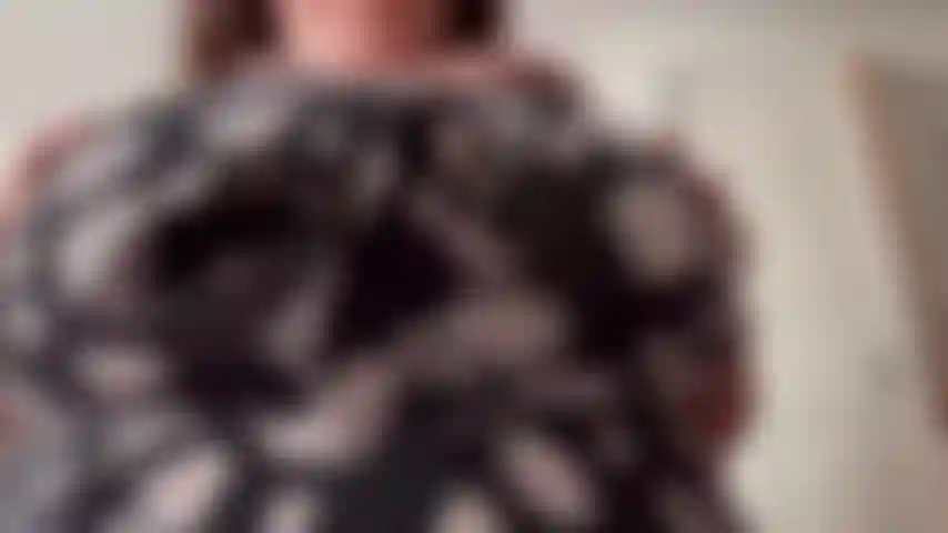 Pulling my dress down to show off my huge tits