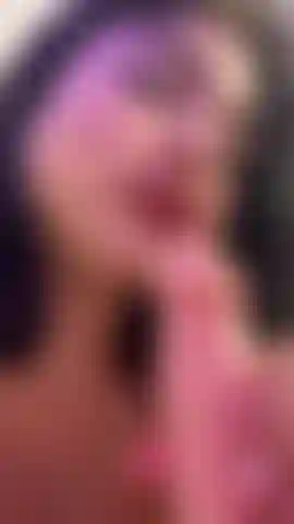 Building tension through teasing and eye contact.