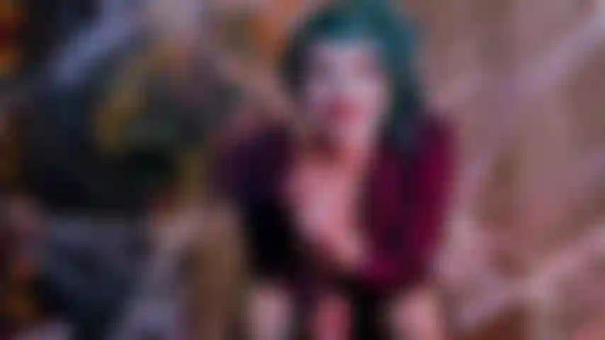 Joker pega a batman.