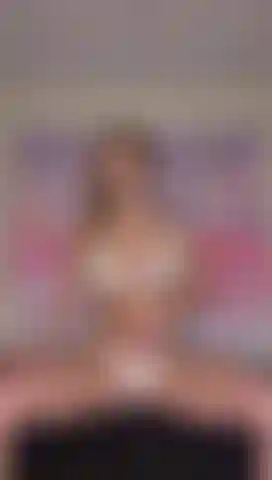 Strip to nude from my sexy lingerie, and masturbation while I sit on top of the back of the couch