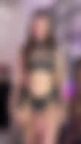 Strap on pegging domination. Wearing my elasticated strap on with girthy 6.5" BWC dildo, and black leather lace up cage top (that I strip from).