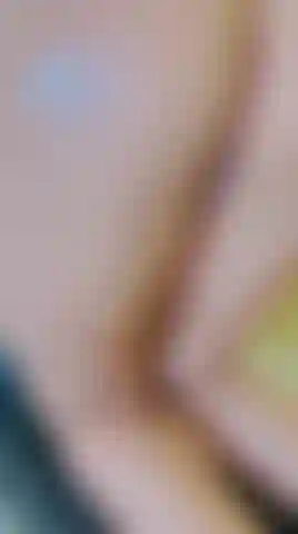 My skin, slick with oil softly glistening on my bed, ready to be admired.