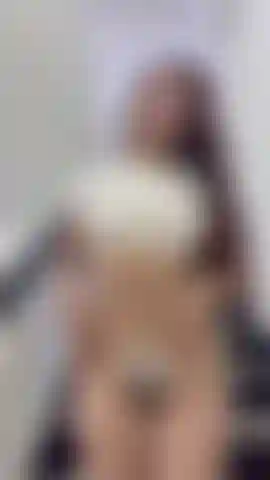 My curves move to the rhythm of desire, slowly undressing me... will you hold out until the end?