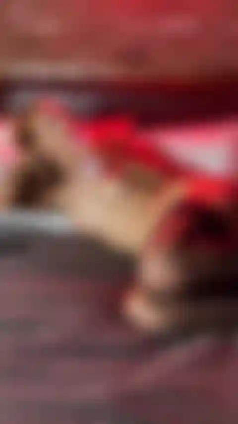 Sucking a dildo bent over