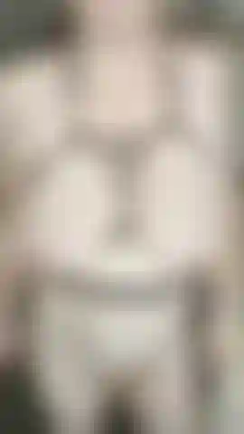 Titties bouncing in fishnet and micro bikini