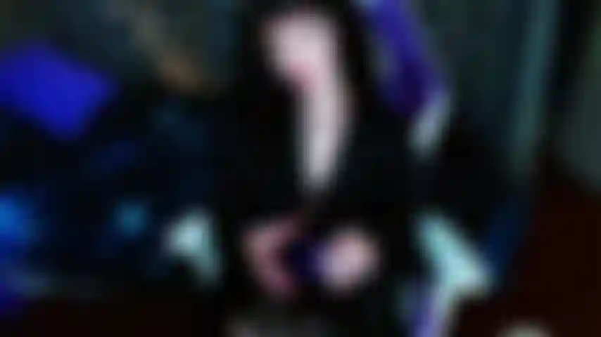 Goth Goddess puts on silky purple nylons and teases you