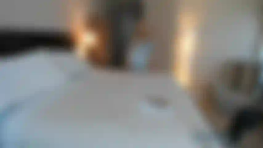 I have to be very sneaky and whisper.  I'm going to tease you, take off my clothes and play with my pussy. All the while whispering dirty talk and encourage you to cum