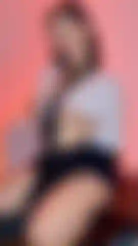 Secretary does toples for her boss at the desk