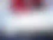 Vacaciones en botas sexys rojas.