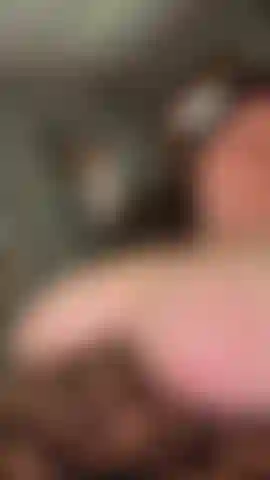 Slow motion laying back in recliner titties