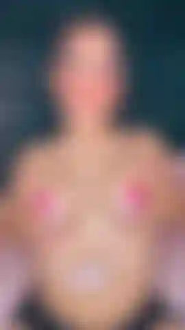 Lovense Clamps hanging from perfect tits