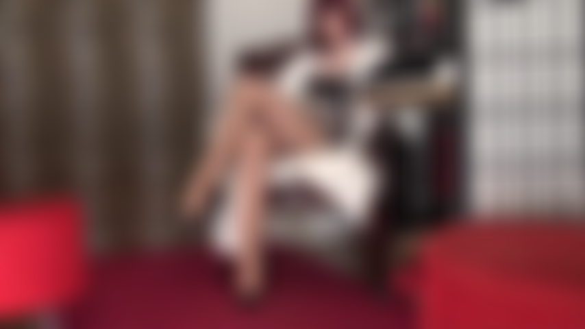 Seductive Mistress - Knowing your weakness for glossy nylon legs and satin lingerie and gloves, Mistress uses her crossed legs as a cock trap, milking you in between them.