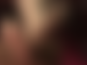 Descansando mis pies en medias sobre un taburete, masajeados con guantes de látex negro. Mmm.