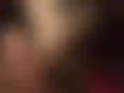 Descansando mis pies en medias sobre un taburete, masajeados con guantes de látex negro. Mmm.