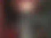 Traje de gato brillante y ajustado con botas altas de cuero, corsé y guantes largos... Tan hermosa para adorar.