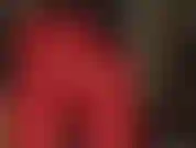 Leggings rojos ajustados y guantes de cuero: la amante se burla con su increíble trasero redondo vestido con leggings rojos ajustados de lycra / spandex, mientras usa guantes largos de cuero.