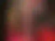 Masturbandome con un consolador cubierto de medias.