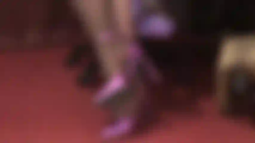 Shiny shades of purple - Mistress uses one of her silk panties to polish and stroke her heels.