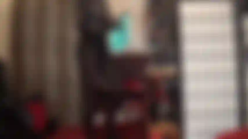 Una sexy braguita provocadora con una variedad de ropa interior de satén brillante y colorida combinada con un body fetichista de pvc y medias wolford negras opacas.