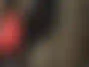 Traje de látex, culo y piernas.