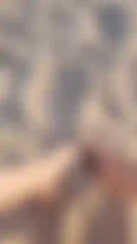 Sinking my cute feet into the sand.