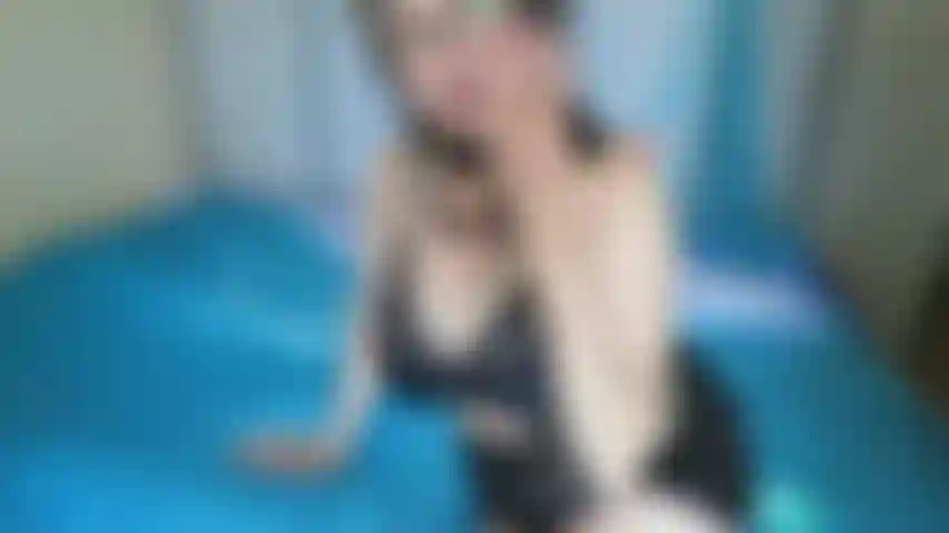 fucking a black glass toy with gorgeous black hosiery on