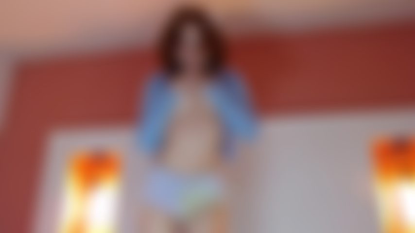 La sensualidad de la pelirroja.