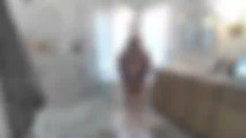 STANDING IN THE BAHTROOM WITH G-STRING & BRA ON---TITS HANGING & PRESS TITS UP AGAINST THE GLASS SHOWER