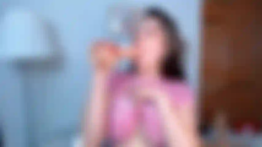 Tania is a naughty girl; she sucks on her huge, semen-covered dildo and lets all the juices run down onto her face and her tight pink top.
