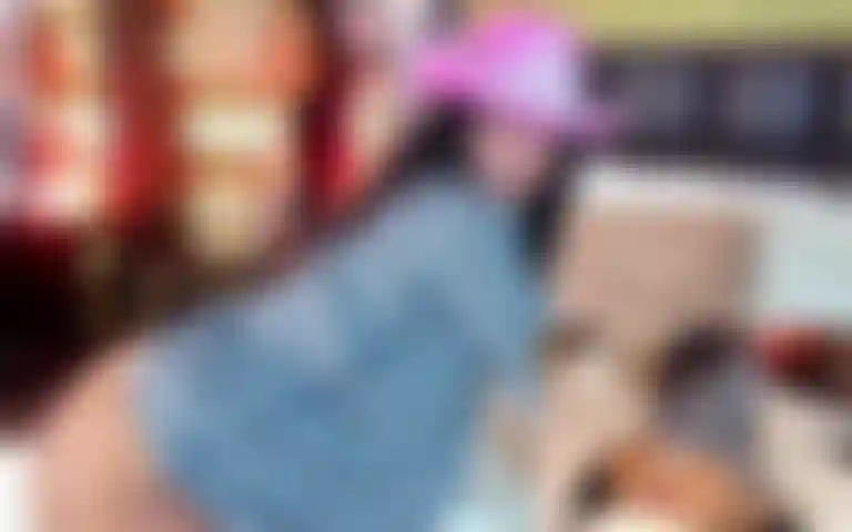 A cowgirl playing with her pussy on double camera