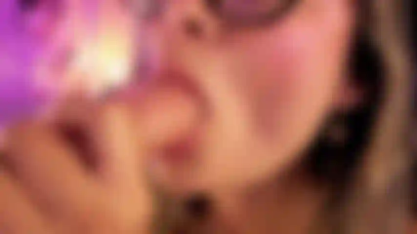 enjoying a blowjob with a big toy