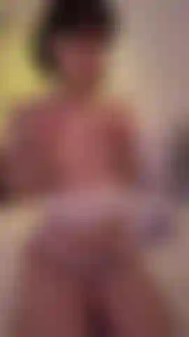 Cute girl bounces up and down on her dildo in reverse cowgirl